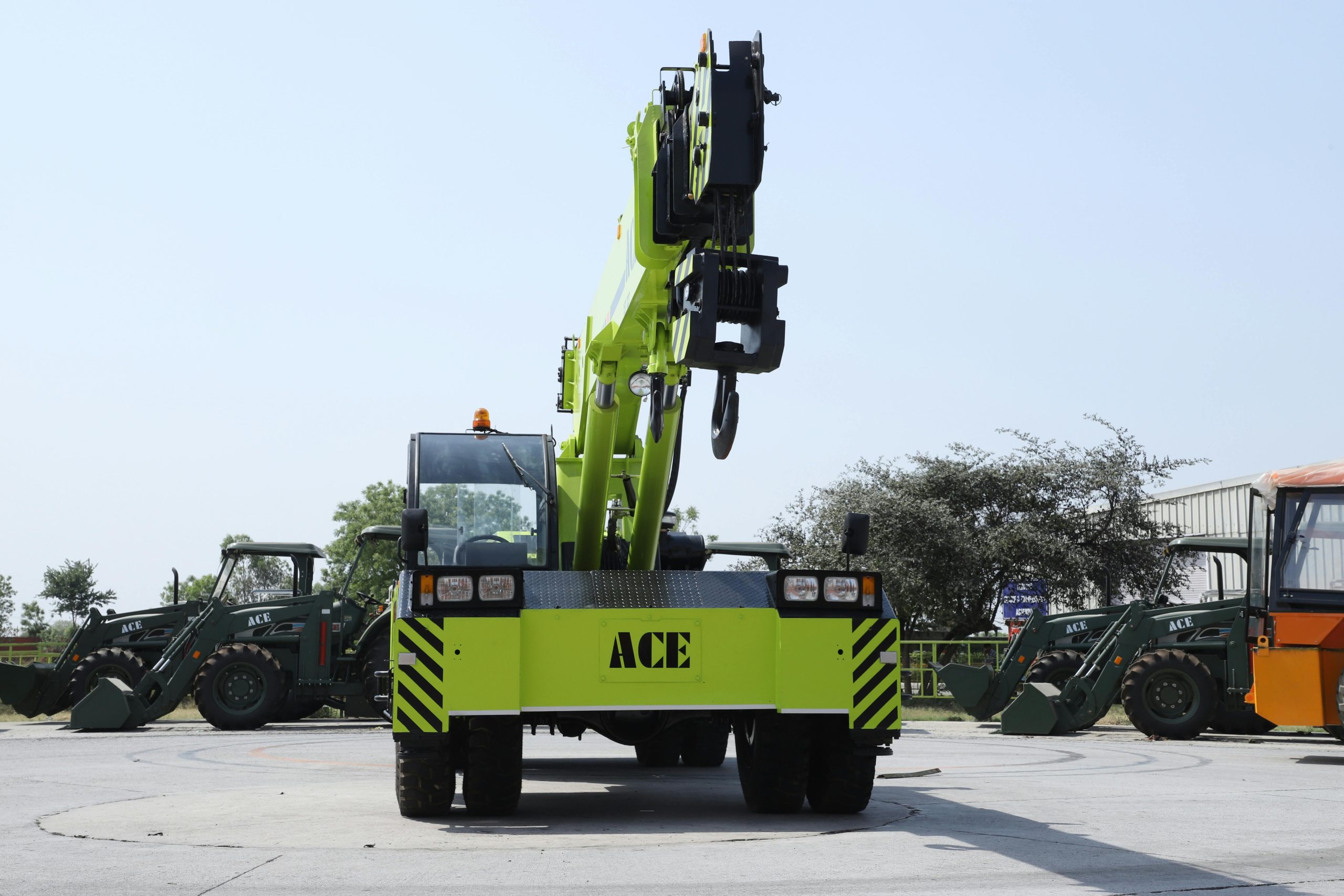 Front view of ACE F25 mobile crane in Faridabad, showcasing industrial machinery outdoors.